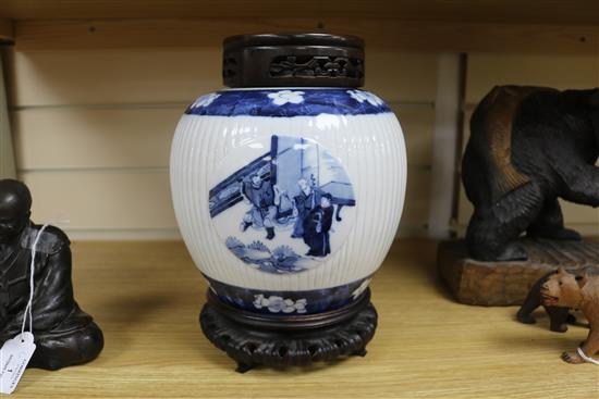 A Chinese blue and white ribbed jar, 18th / 19th century, later wood cover and stand height 20cm excl. cover and stand